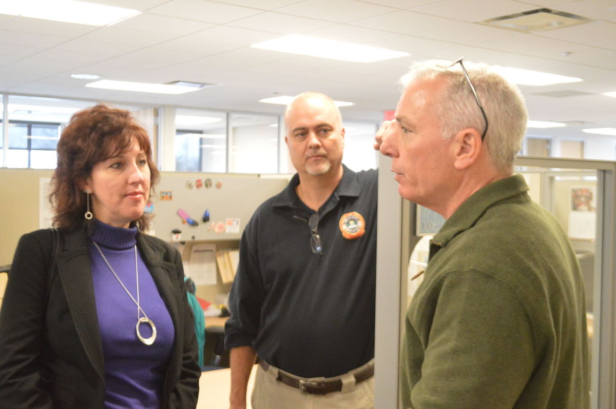 Jewish Federation security officials Brenda Moxley of Miami, Mark Dowd of Cincinnati and Jim Hartnett of Cleveland chat following a drill.